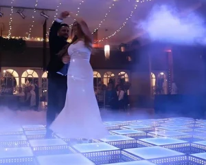 Wedding reception with colorful LED dance floor lighting