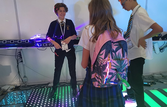 Product demonstration to visitors at exhibition