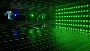 Mega Laser interactive game room with players engaging in laser challenges.