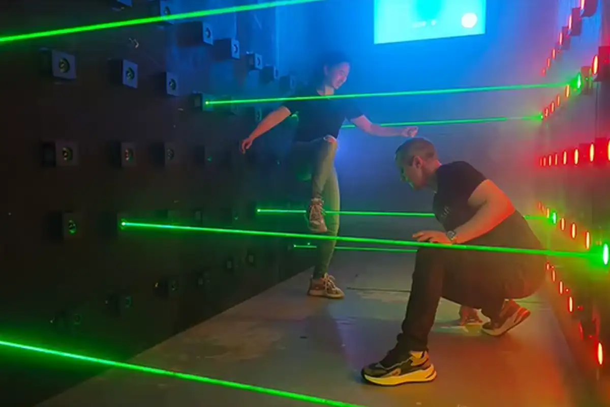 Players enjoying an immersive interactive gaming room, a modern alternative to traditional arcade machines for higher engagement