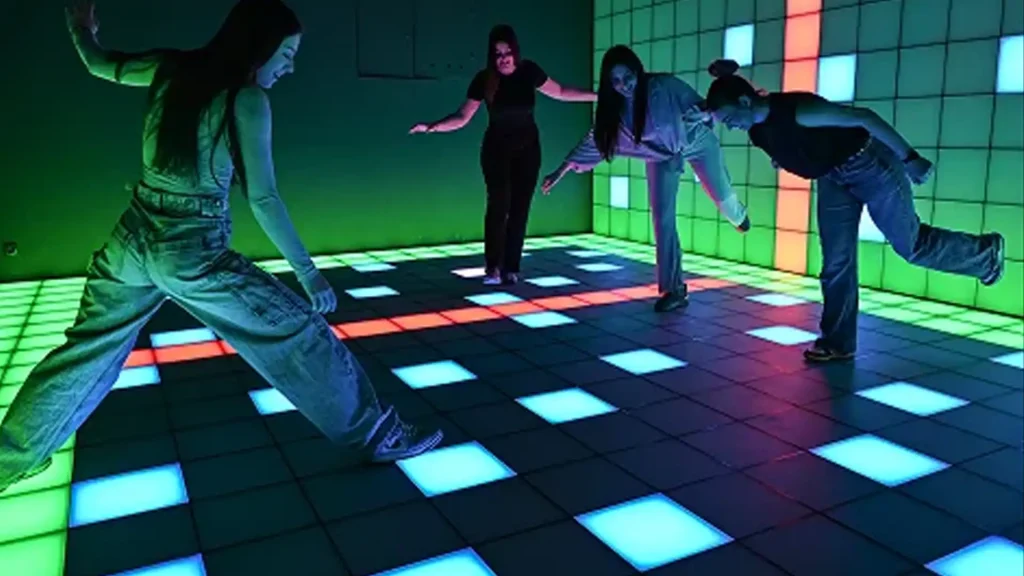 players reacting to lights in activate games using floor and wall interaction