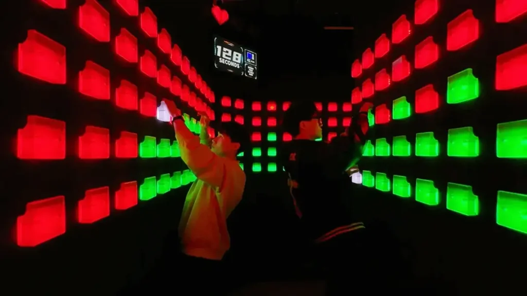 interactive climbing wall attraction for family entertainment center
