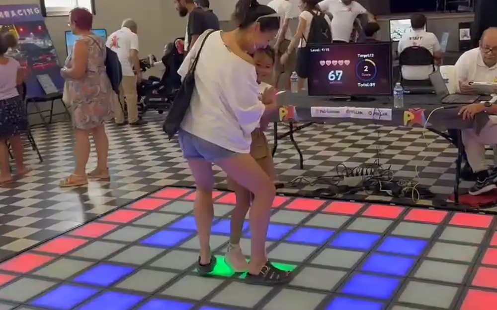 interactive LED game floor using capacitive sensing technology in commercial entertainment venue
