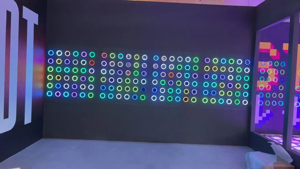 How to Choose an Active Gaming Room Supplier: Factory Direct vs Local (2026) 5 FEC operator consulting with active gaming room supplier on floor plan review and equipment specification