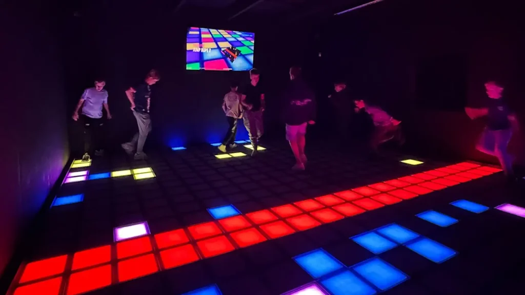 pixel floor game vs arcade vs VR comparison in commercial FEC venue