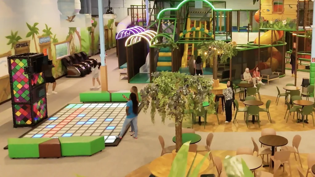 Interactive Game Floor for Indoor Playgrounds: Is It Right? 3 Interactive game floor positioned adjacent to soft play structures in an indoor playground