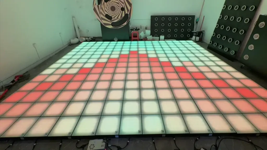 OEM Interactive Game Floor: A Guide for Distributors and Private Label Buyers (2026) 4 Factory production line manufacturing private label interactive game floor systems