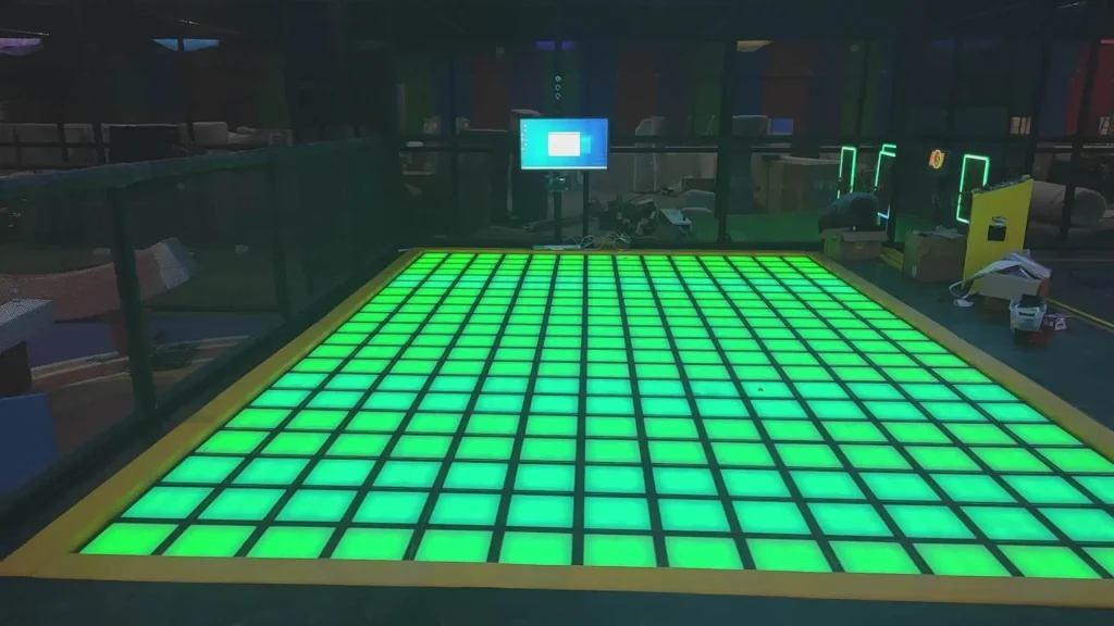 Interactive Game Floor for Trampoline Parks: Layout, ROI & Installation Guide (2026) 1 Interactive LED game floor installed as a secondary attraction inside a trampoline park