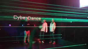 Blog 7 Players ducking under laser beams during gameplay at an interactive laser maze venue