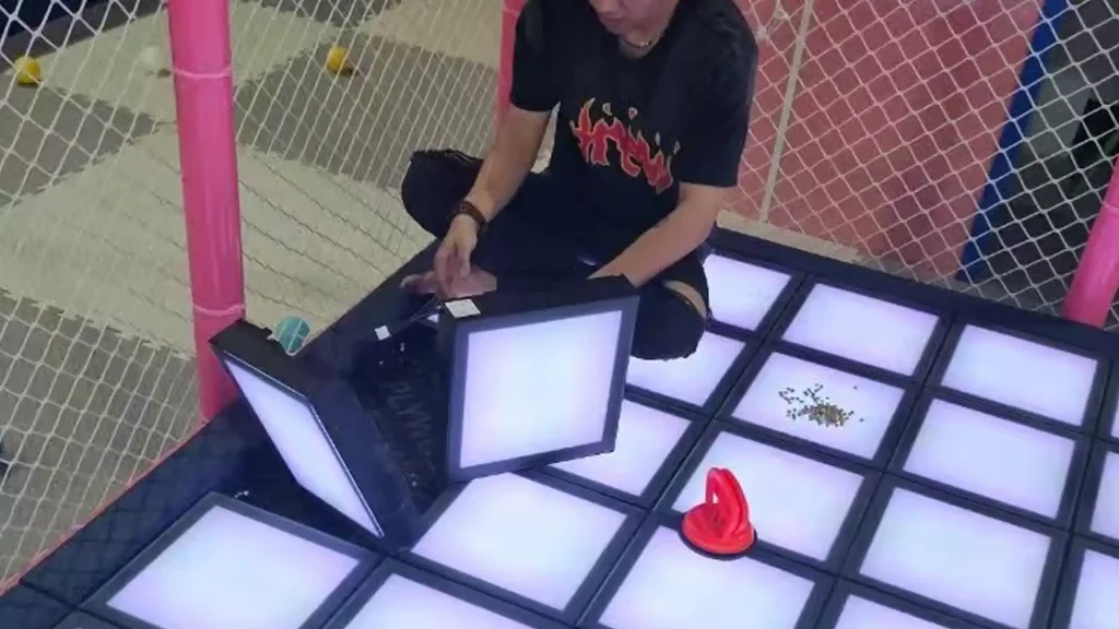 Interactive Game Floor Project Case Study: Planning a 231 m² Commercial Gaming Room in Jordan 4 Victor installation team commissioning an interactive game floor system