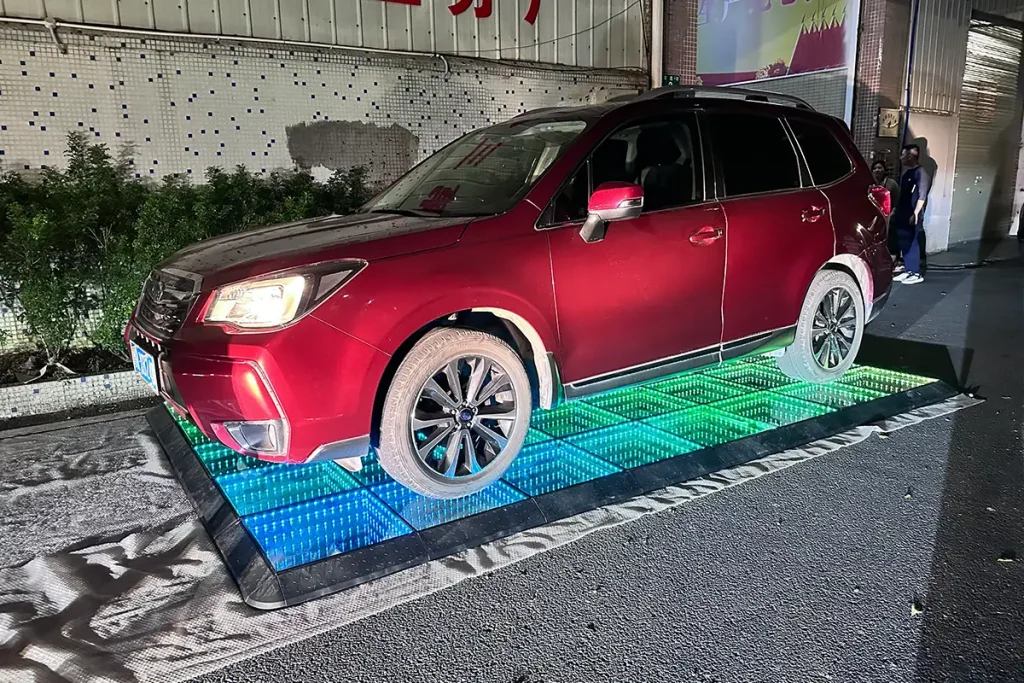 Interactive Game Floor Dimensions & Space Requirements 3 Car driven over interactive game floor tiles during load testing